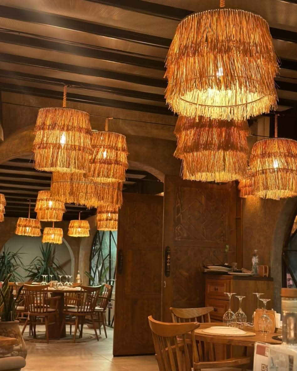 Artisanal Layered Raffia Pendant Light - Bohemian Luxury Chandelier for Exotic Interiors & Verandas